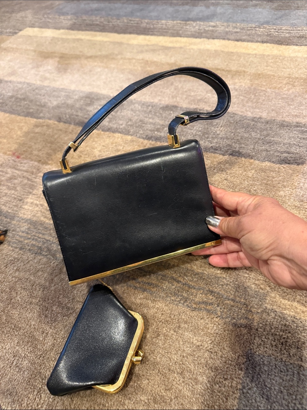 Koret Black Leather Top-Handle Clutch with Gold Trim